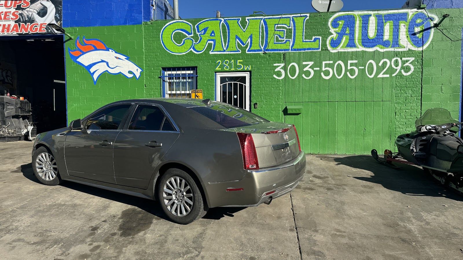 A sedan outside the shared Camel location on West 8th Avenue in Denver